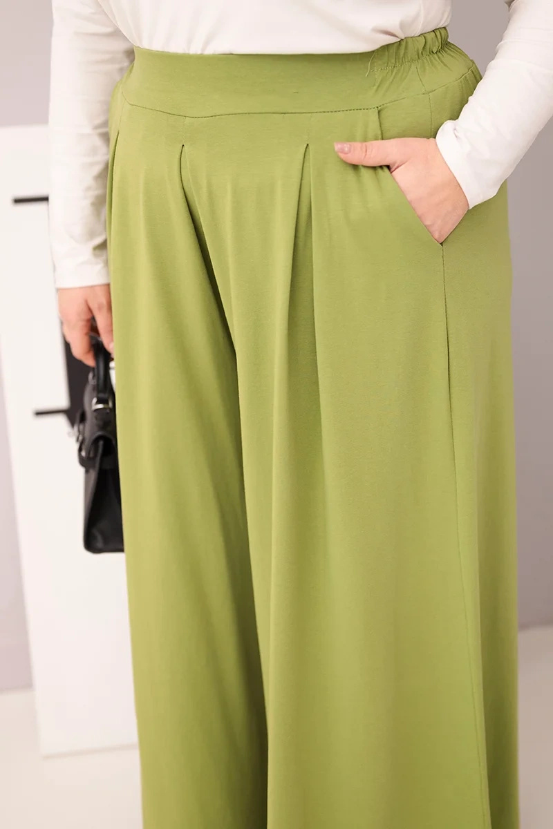 Spodnie damskie bawełniane Plus Size o szerokiej nogawce i luźnym kroju pistacjowe - obrazek 4